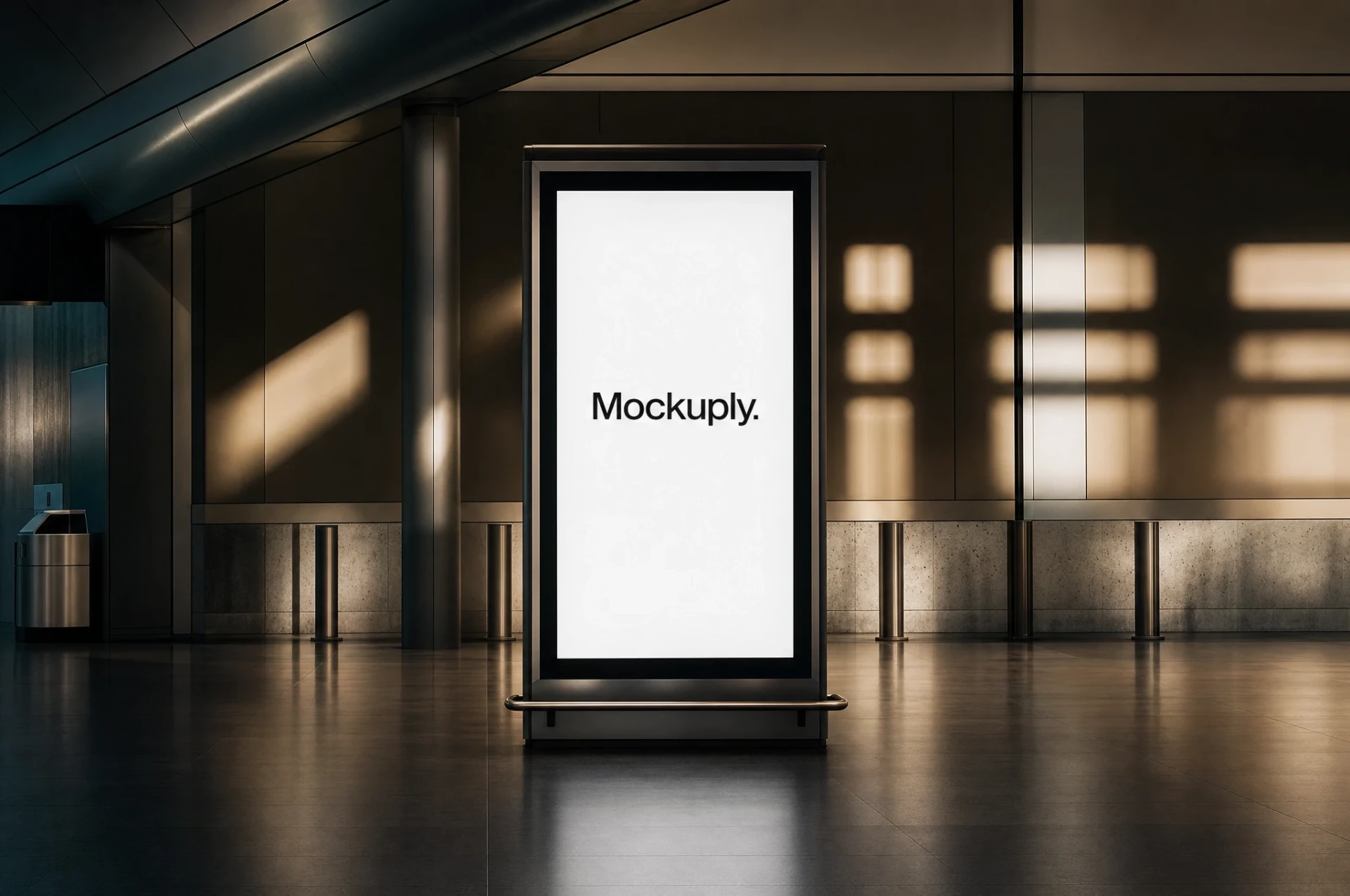 Vertikal digital annonsyta i en modern lobby med dagsljus